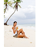   Young Woman, Indulgence & Consumption, Relaxation & Recreation, Beach, Vacation